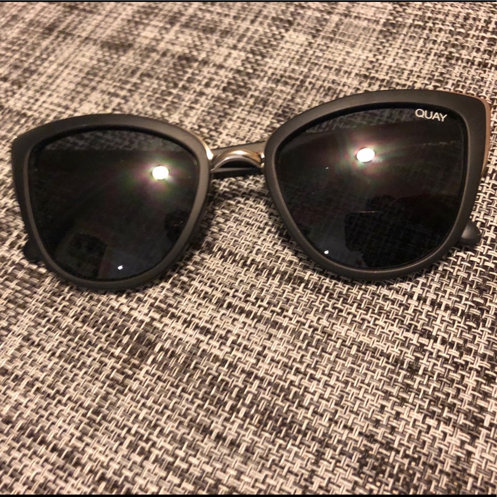Black Quay sunglasses with silver accents.